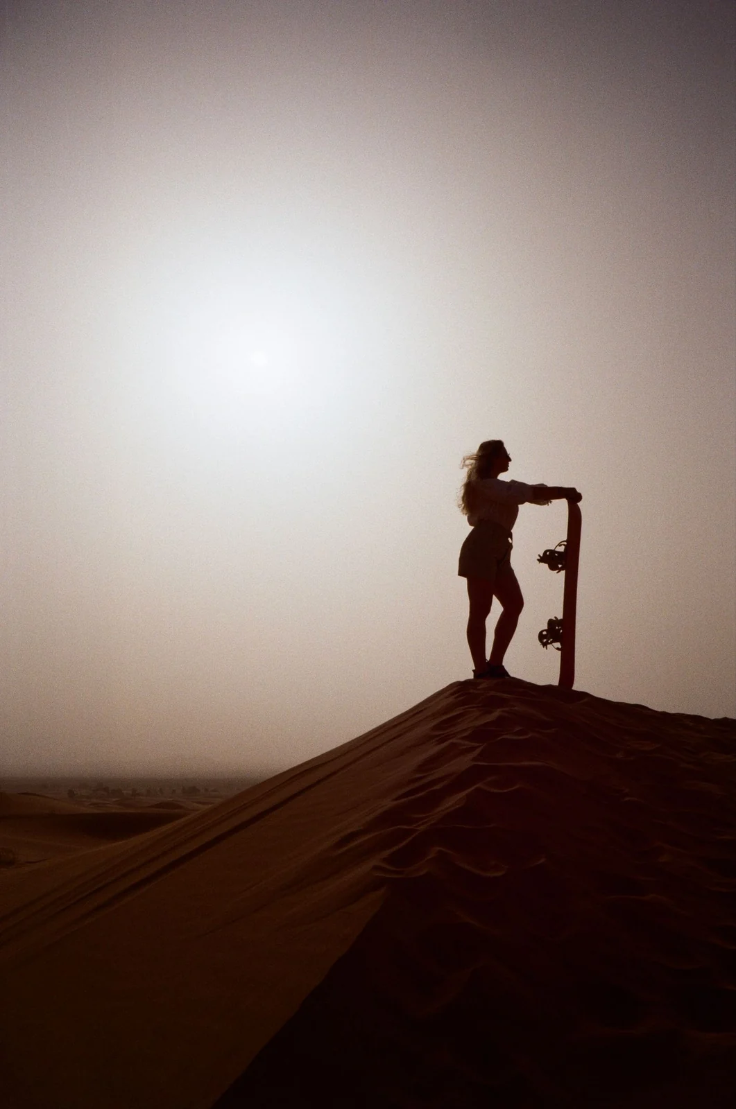 Sandboarding — illustrative activity photograph, not Timlalin