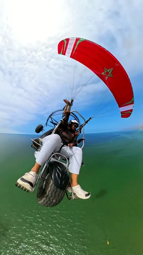 Tandem paramotor flight · actual flying partner