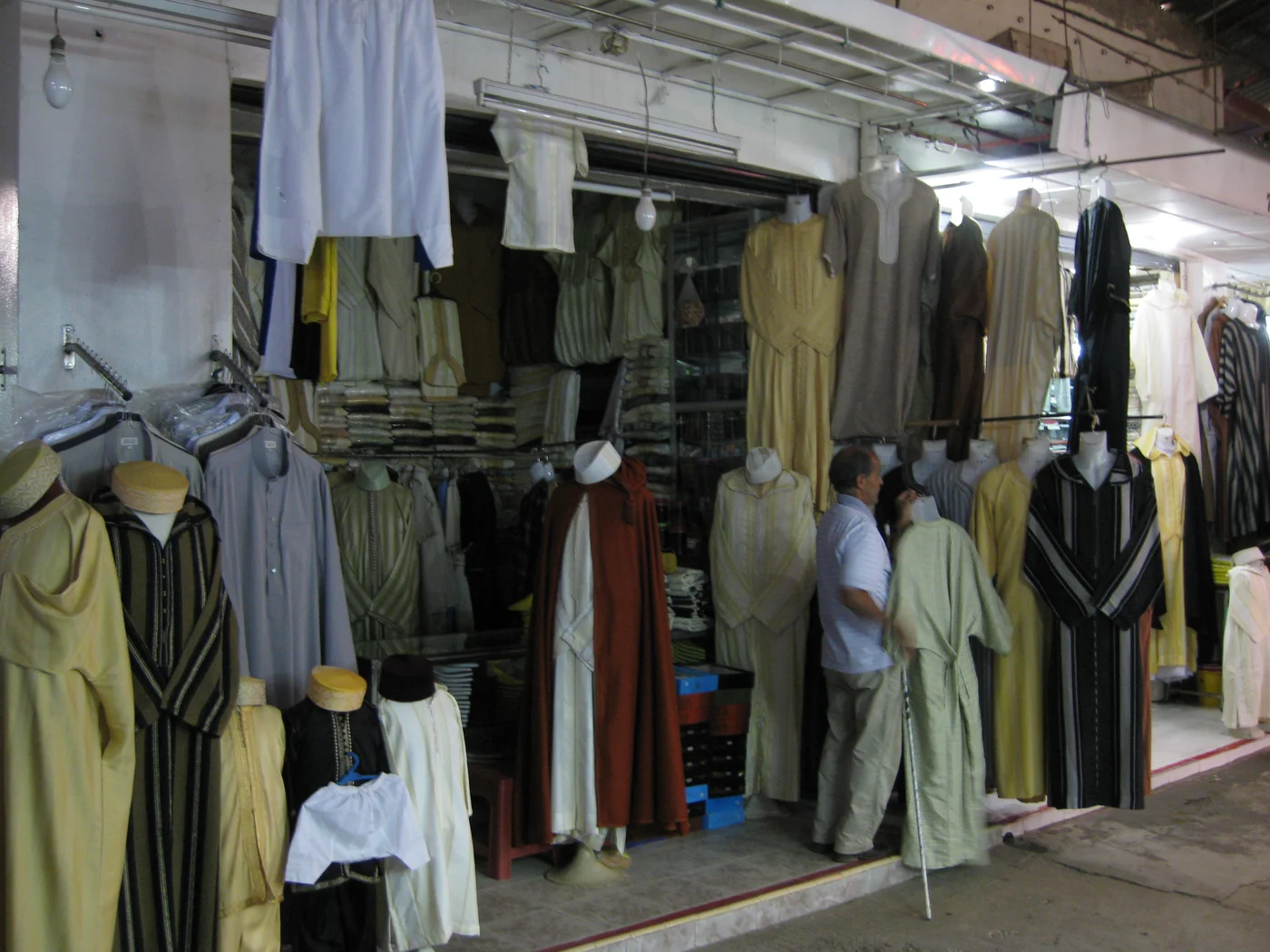 Traditional clothes at Souk El Had, Agadir · regional market illustration