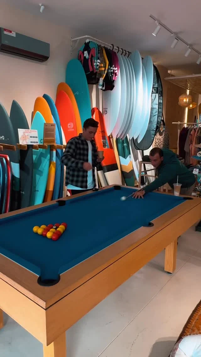 Pool table and surf shop inside Nomadbay